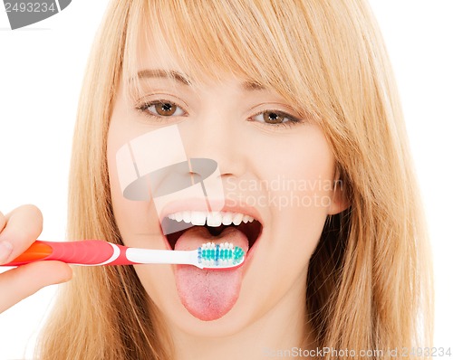 Image of teenage girl with toothbrush