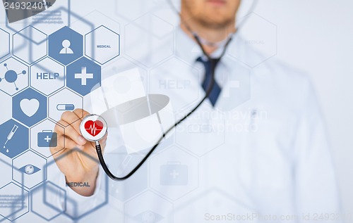 Image of male doctor with stethoscope and virtual screen