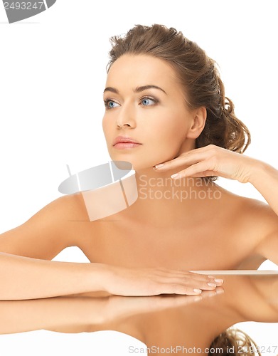 Image of woman with mirror
