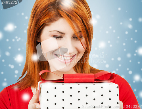 Image of happy woman with gift box