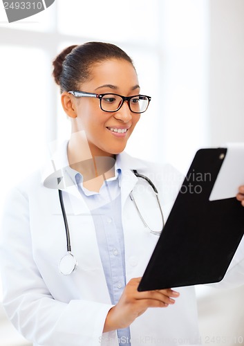 Image of african female doctor in hospital