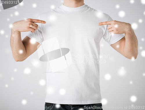 Image of man in blank white t-shirt