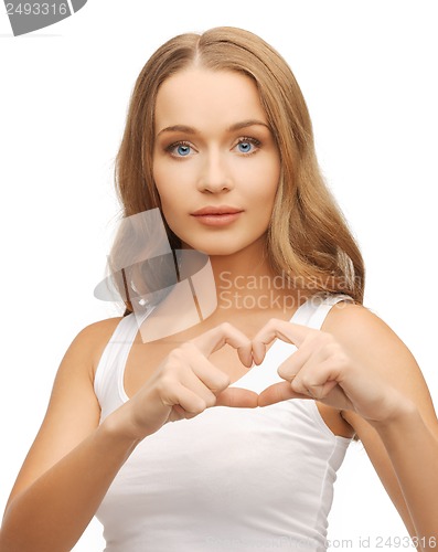 Image of woman showing heart shape