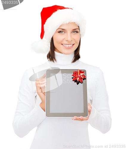 Image of woman in santa helper hat with tablet pc