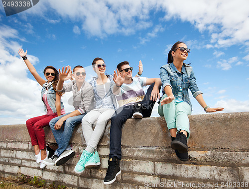 Image of group of teenagers hanging out