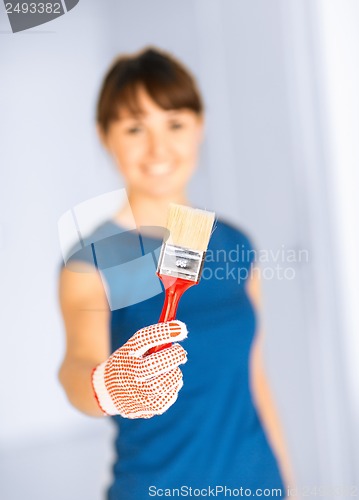 Image of woman with paintbrush