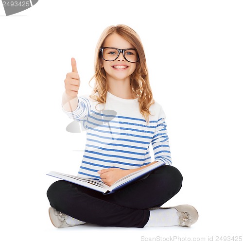 Image of student girl studying and reading book
