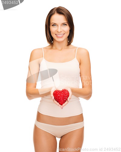 Image of beautiful woman in cotton underwear and red heart