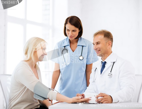 Image of doctor and patient in hospital