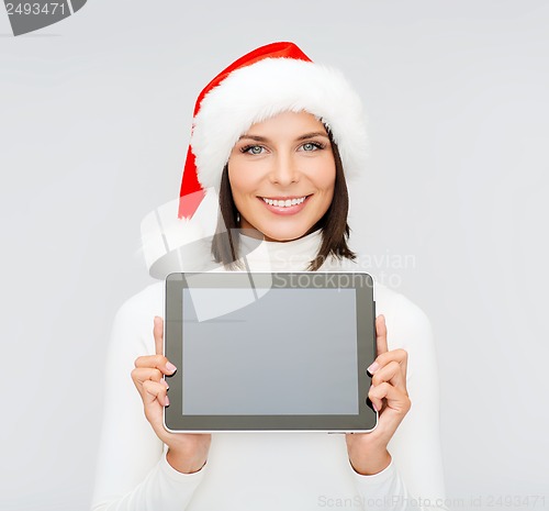 Image of woman in santa helper hat with tablet pc