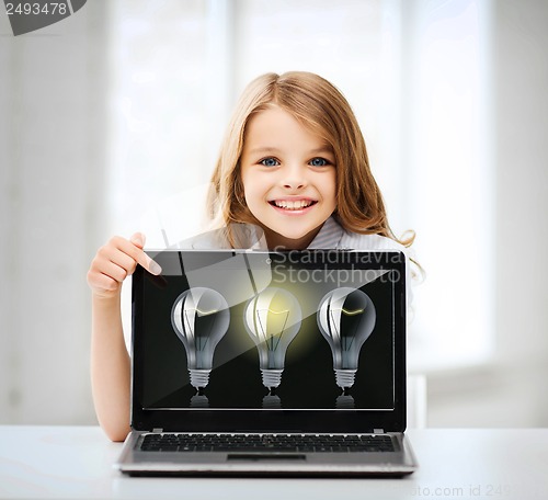 Image of girl with laptop pc at school