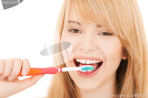 Image of teenage girl with toothbrush