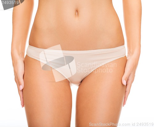 Image of woman in cotton underwear showing slimming concept