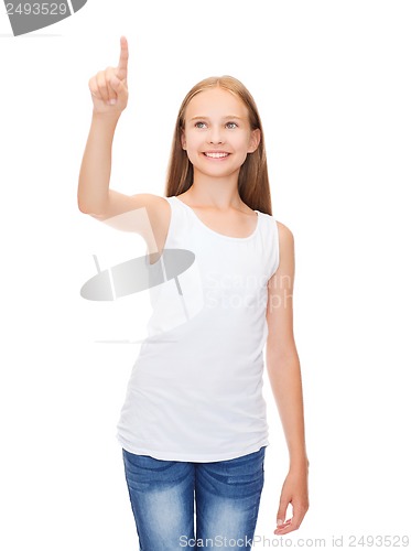 Image of girl in blank white shirt pointing to something