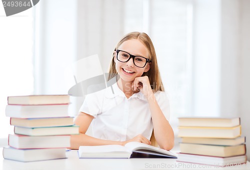 Image of student girl studying at school