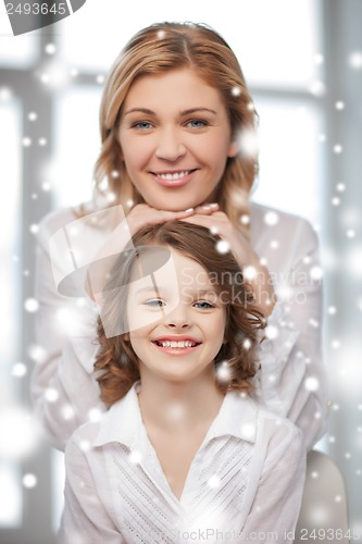 Image of happy mother and daughter