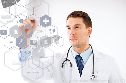 Image of doctor with stethoscope and virtual screen