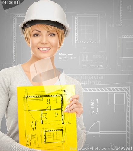 Image of female contractor in helmet