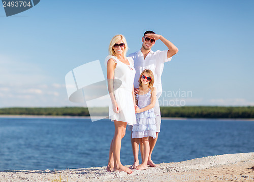 Image of happy family with blue sky