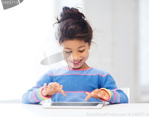 Image of girl with tablet pc at home