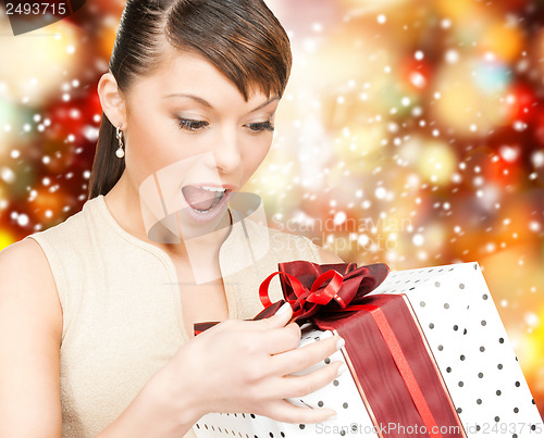 Image of happy woman with gift box