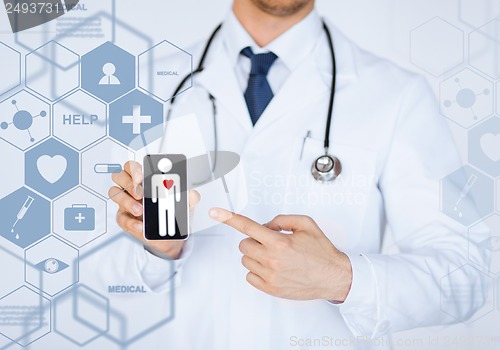 Image of male doctor with stethoscope and virtual screen