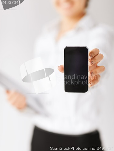 Image of woman hand with smartphone