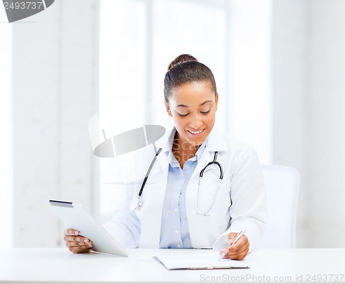 Image of female doctor with tablet pc