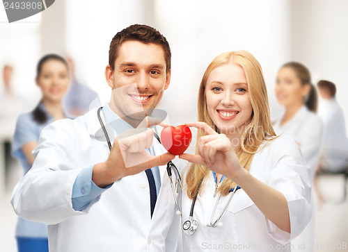 Image of cardiologists with heart
