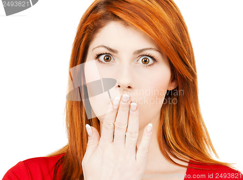 Image of amazed woman with hand over mouth