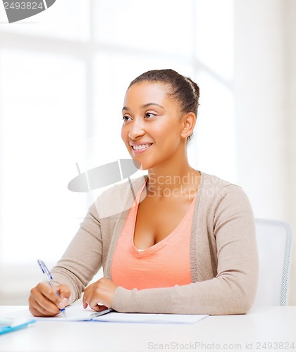 Image of international student studying in college