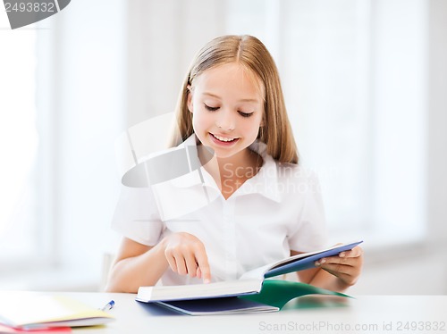 Image of student girl studying at school