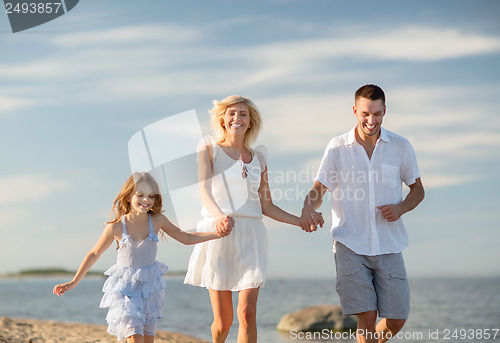 Image of happy family at the seaside
