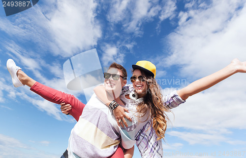 Image of teenagers having fun outside