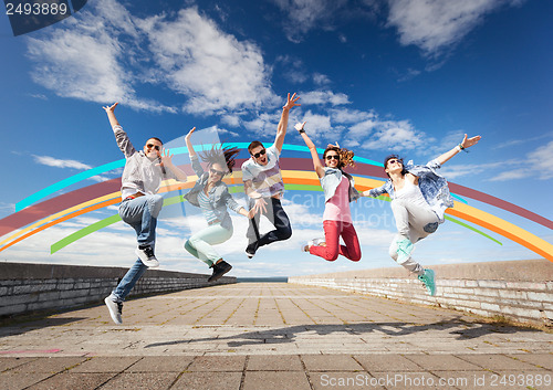 Image of group of teenagers jumping