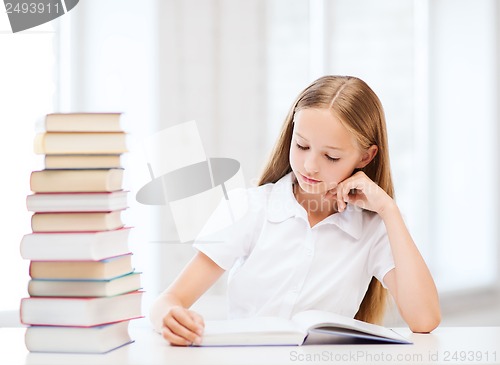 Image of student girl studying at school