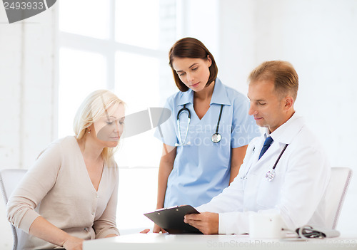 Image of doctor with patient in hospital