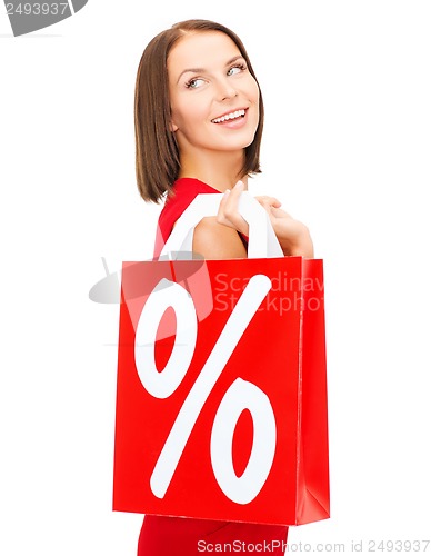 Image of woman in red dress with shopping bags