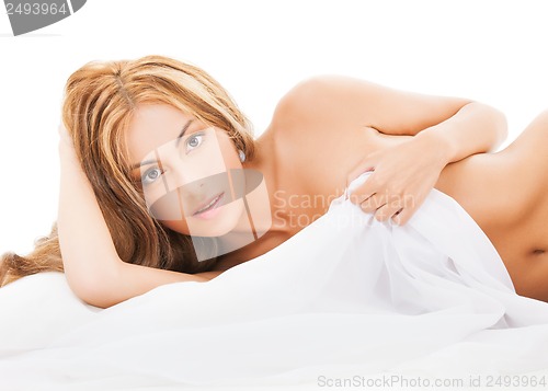 Image of beautiful naked woman in the bed