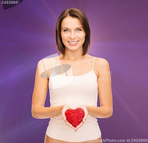 Image of beautiful woman in cotton underwear and red heart
