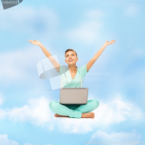 Image of woman sitting on the cloud with laptop