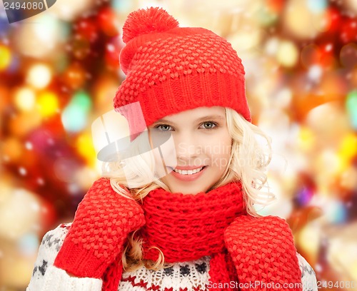 Image of teenage girl in hat, muffler and mittens