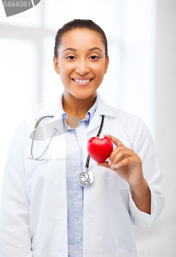 Image of african doctor with heart