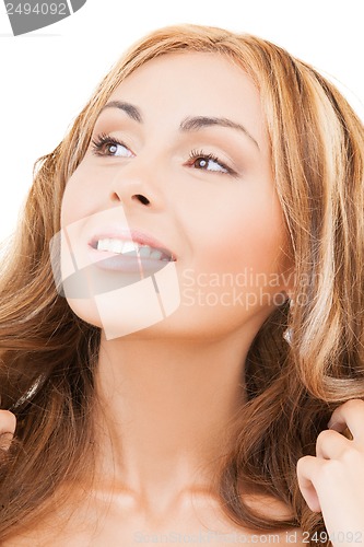 Image of face of happy woman with long hair