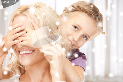 Image of mother and daughter making a joke