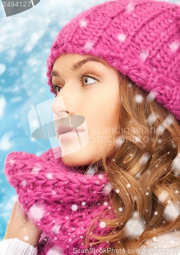 Image of woman in hathat and scarf