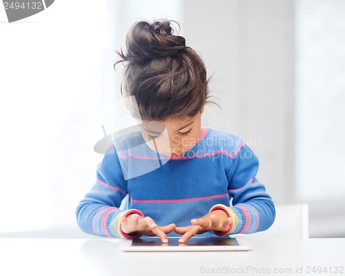 Image of girl with tablet pc at home