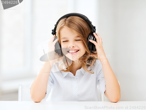 Image of girl with headphones listening to music