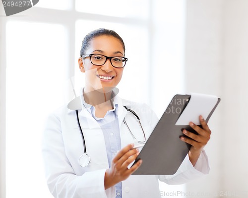 Image of african female doctor in hospital