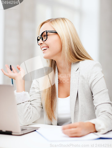 Image of businesswoman with documents